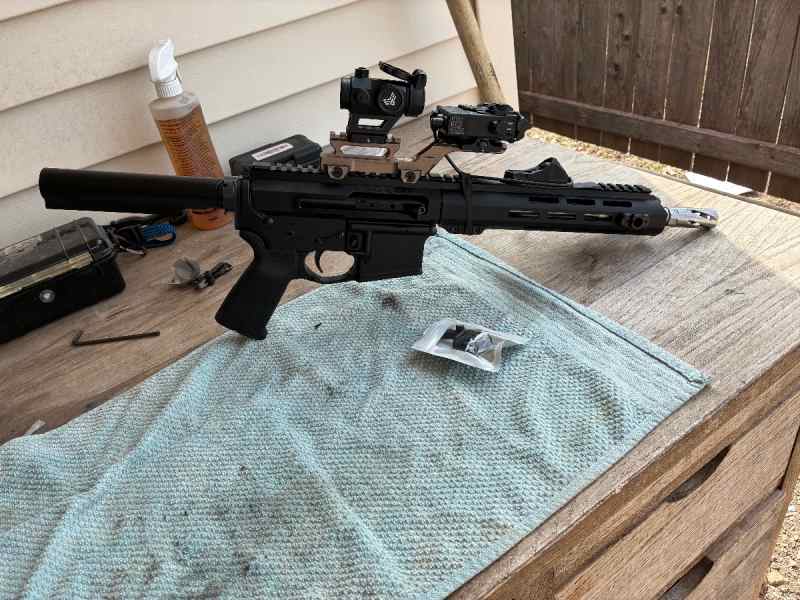Side charging AR pistol