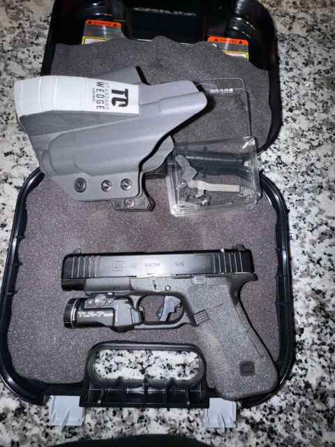 Two BlackHawk Glock 19/17/22 holsters