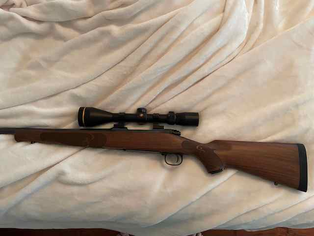 model 70 featherweight 6.5 creemoor with leupold