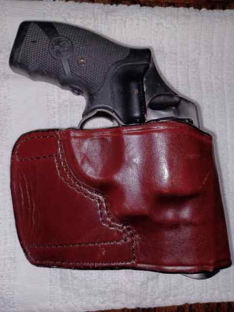 RUGER SP101 W/ CT LASER GRIPS AND HOLSTER $700